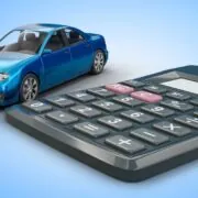 financiamento de veículos: calculadora e miniatura de carro