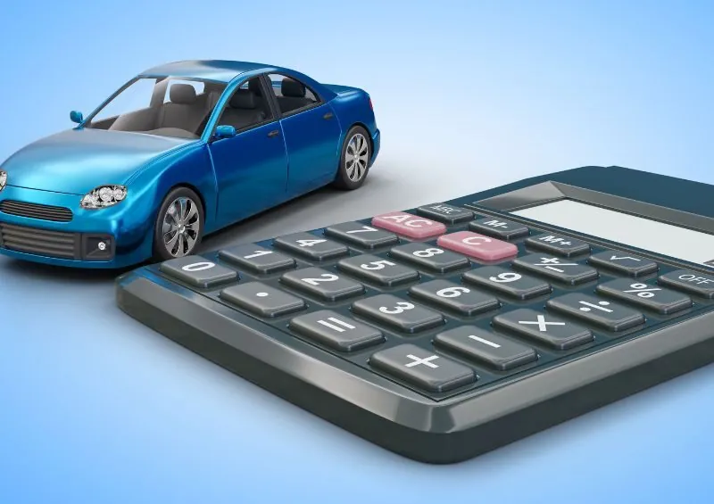 financiamento de veículos: calculadora e miniatura de carro